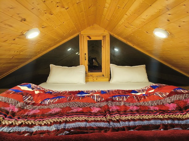 Imagen de la habitación del Hotel The Sunbird Retreat. Foto 13