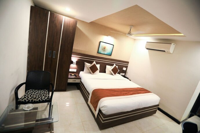Imagen de la habitación del Hotel The Suncity. Foto 16