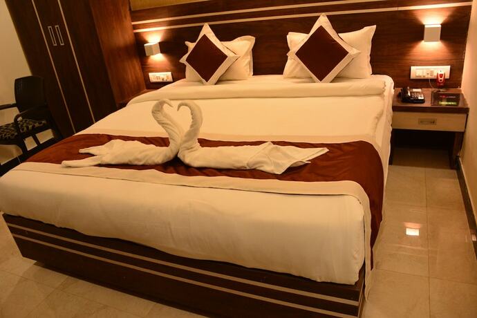 Imagen de la habitación del Hotel The Suncity. Foto 17