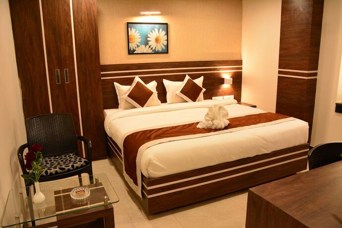 Imagen de la habitación del Hotel The Suncity. Foto 20