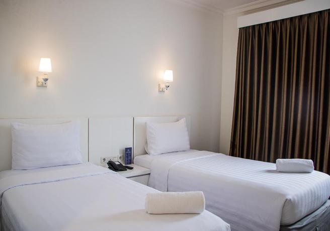 Imagen de la habitación del Hotel The Sunerra Bandung City Center. Foto 8