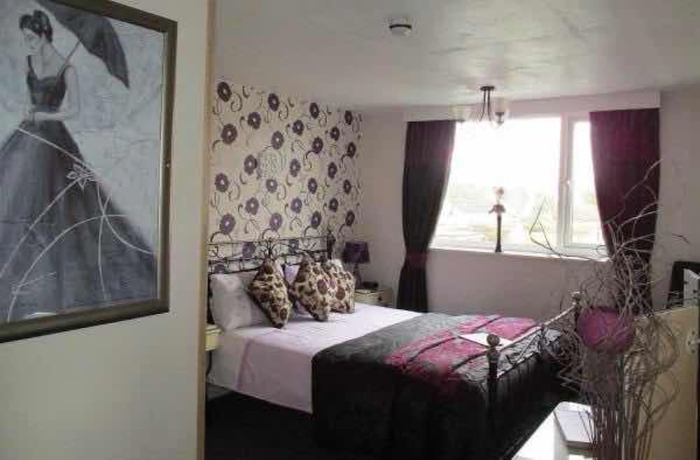 Imagen de la habitación del Hotel The Sunningdale. Foto 6