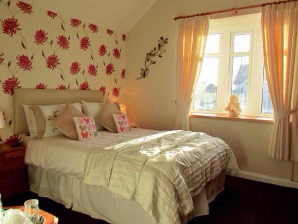 Imagen de la habitación del Hotel The Sunningdale. Foto 10