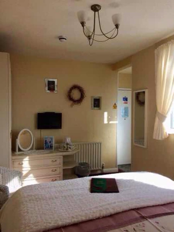 Imagen de la habitación del Hotel The Sunningdale. Foto 12