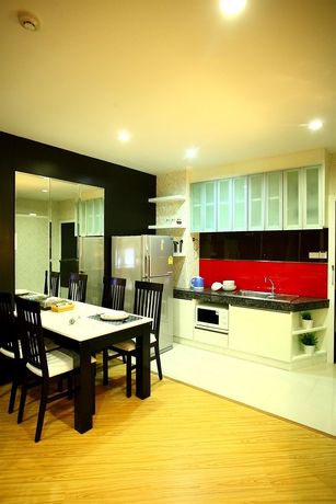 Imagen de la habitación del Hotel The Sunreno. Foto 7