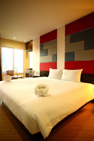Imagen de la habitación del Hotel The Sunreno. Foto 14