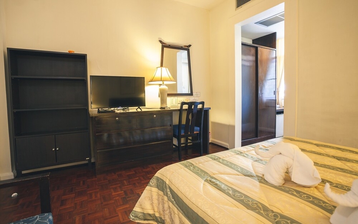Imagen de la habitación del Hotel The Sunrise Residence. Foto 3