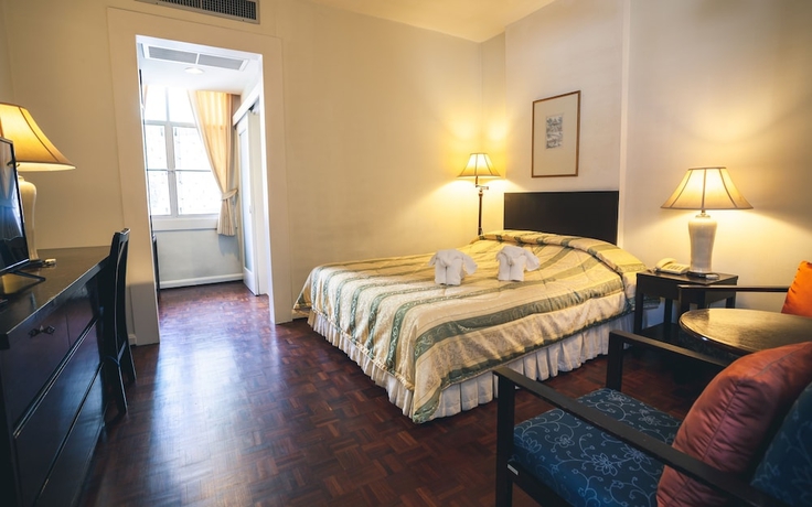 Imagen de la habitación del Hotel The Sunrise Residence. Foto 4