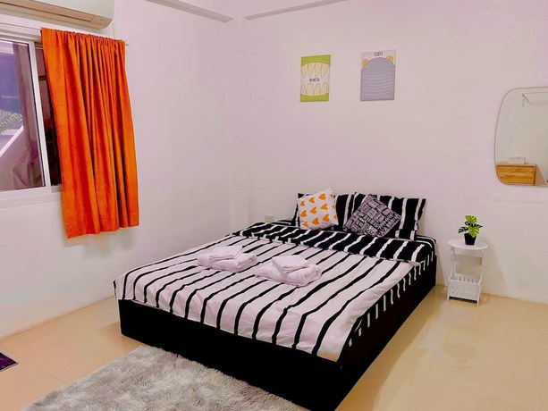 Imagen de la habitación del Hotel The Sunset Bangsaen Seaview. Foto 11