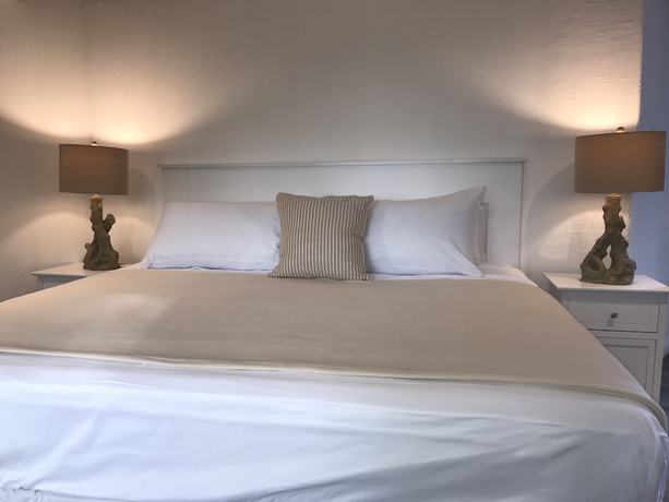 Imagen de la habitación del Hotel The Sunset Cove and Rainbow Room. Foto 4