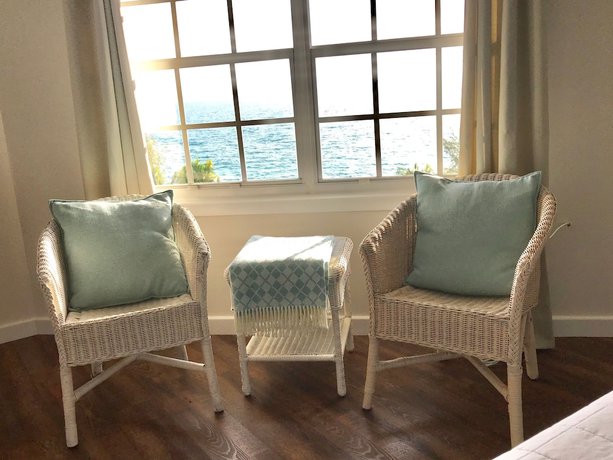 Imagen de la habitación del Hotel The Sunset Cove and Rainbow Room. Foto 10