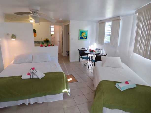 Imagen de la habitación del Hotel The Sunset Cove and Rainbow Room. Foto 14