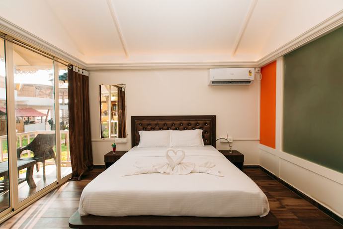 Imagen de la habitación del Hotel The Sunset Guest House. Foto 2