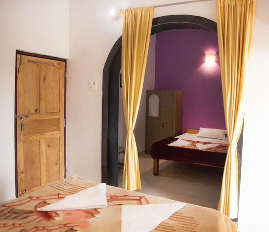 Imagen de la habitación del Hotel The Sunset Guest House. Foto 5