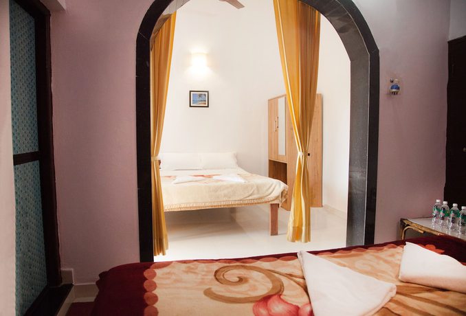 Imagen de la habitación del Hotel The Sunset Guest House. Foto 8