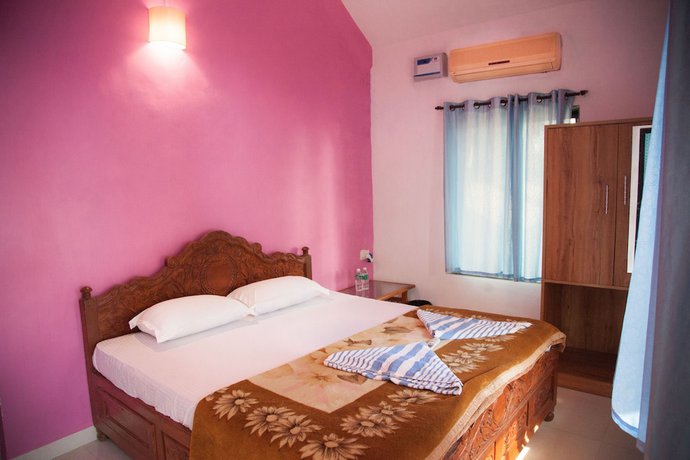Imagen de la habitación del Hotel The Sunset Guest House. Foto 9