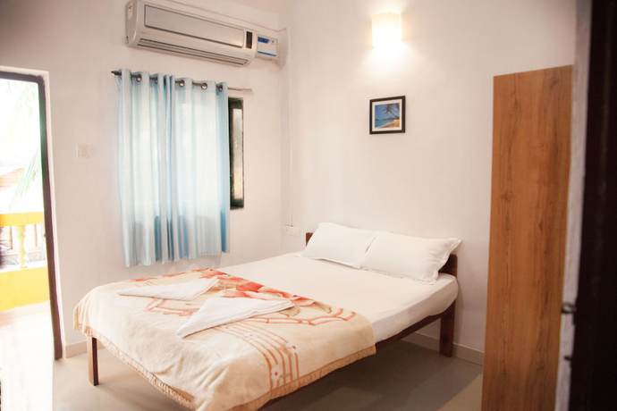 Imagen de la habitación del Hotel The Sunset Guest House. Foto 10