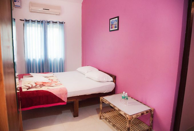 Imagen de la habitación del Hotel The Sunset Guest House. Foto 11