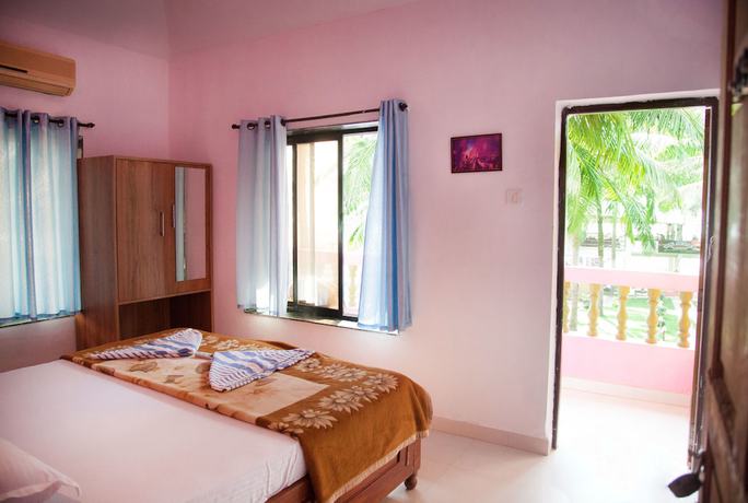 Imagen de la habitación del Hotel The Sunset Guest House. Foto 12