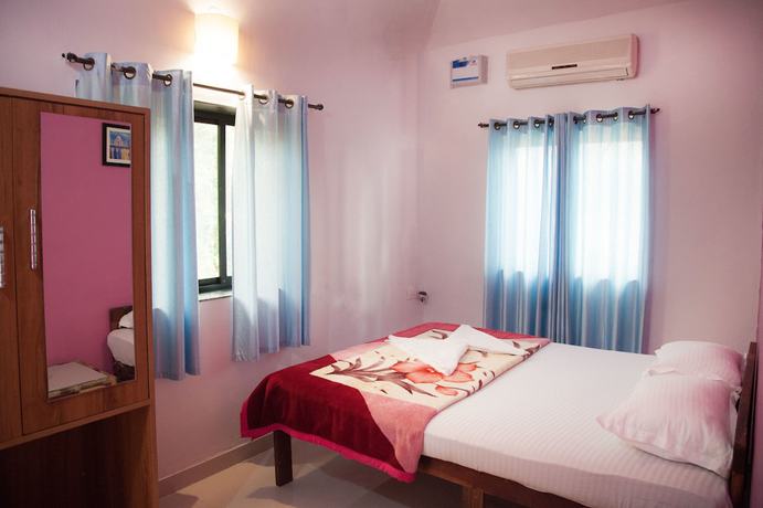 Imagen de la habitación del Hotel The Sunset Guest House. Foto 15