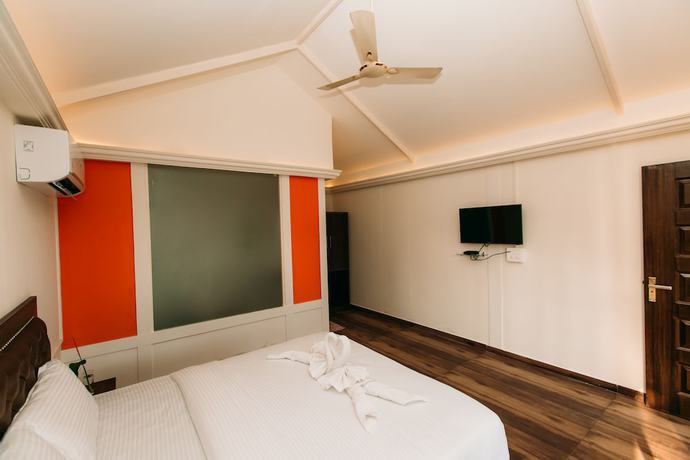 Imagen de la habitación del Hotel The Sunset Guest House. Foto 17