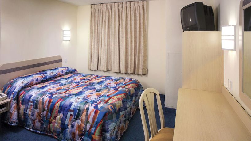 Imagen de la habitación del Hotel The Sunset Inn, Oriskany. Foto 4