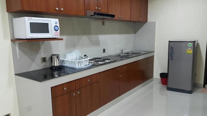 Imagen de la habitación del Hotel The Supara. Foto 9