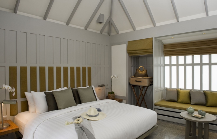 Imagen de la habitación del Hotel The Surin Phuket. Foto 6