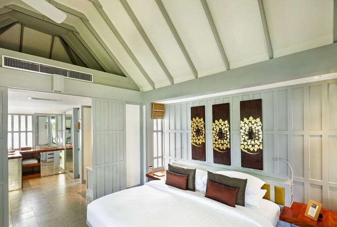 Imagen de la habitación del Hotel The Surin Phuket. Foto 7