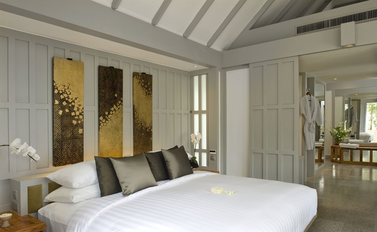 Imagen de la habitación del Hotel The Surin Phuket. Foto 12