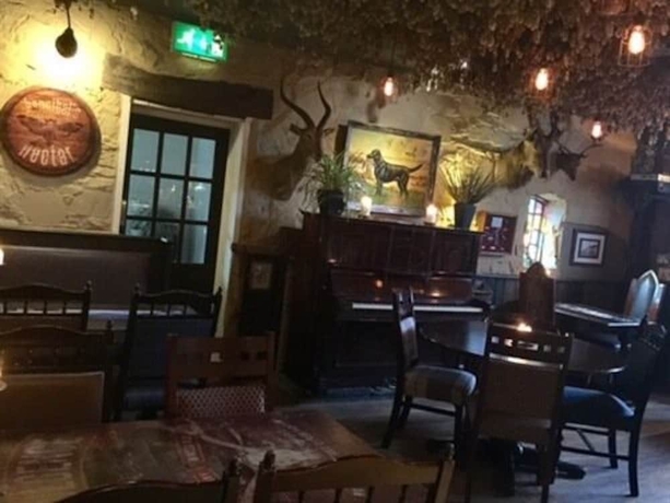 Imagen del bar/restaurante del Hotel The Swan Inn, Nantwich. Foto 2