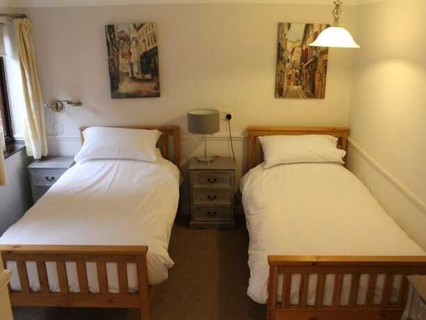 Imagen de la habitación del Hotel The Swan Motel. Foto 13