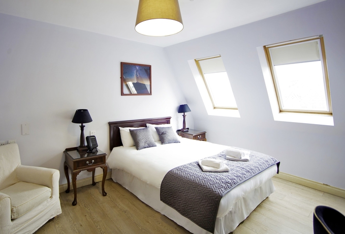 Imagen de la habitación del Hotel The Sweeney. Foto 11