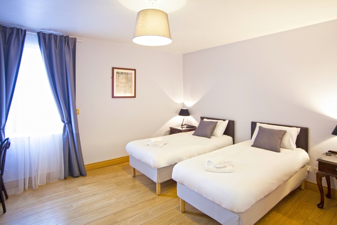 Imagen de la habitación del Hotel The Sweeney. Foto 12