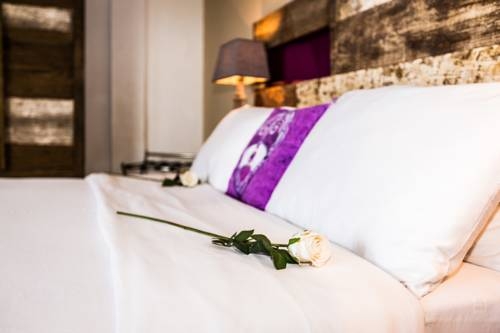 Imagen de la habitación del Hotel The Swiss. Foto 2