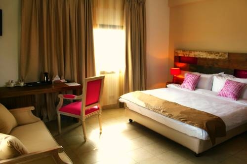 Imagen de la habitación del Hotel The Swiss. Foto 5