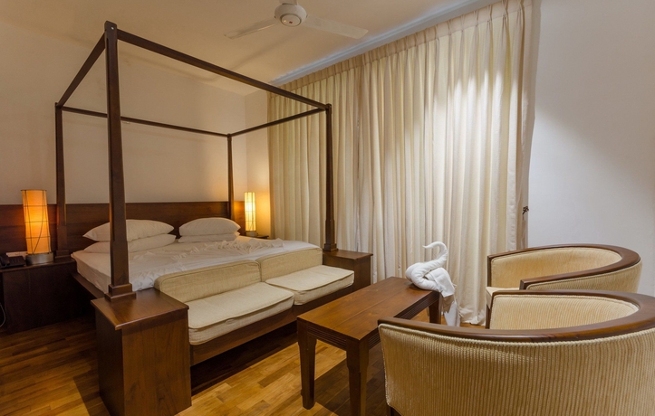 Imagen de la habitación del Hotel The Swiss Residence. Foto 12