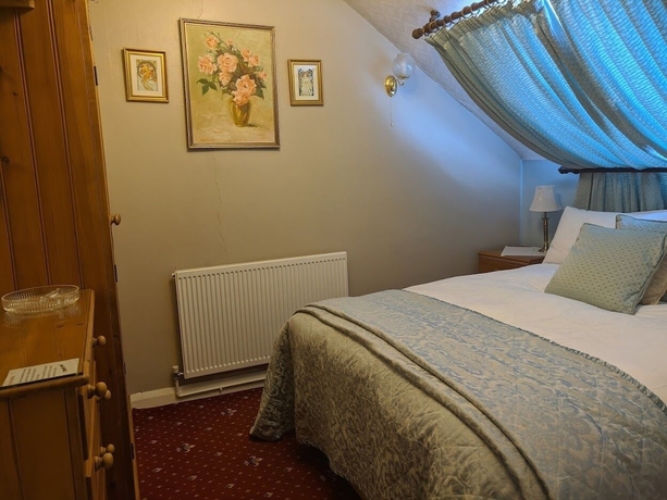 Imagen de la habitación del Hotel The Sycamore Guest House. Foto 4