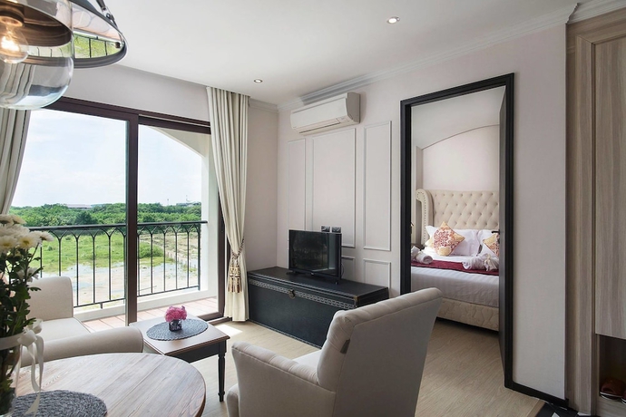 Imagen de la habitación del Hotel The Symphony Suites Pattaya. Foto 2
