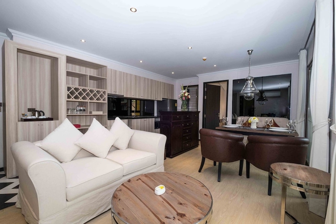 Imagen de la habitación del Hotel The Symphony Suites Pattaya. Foto 5