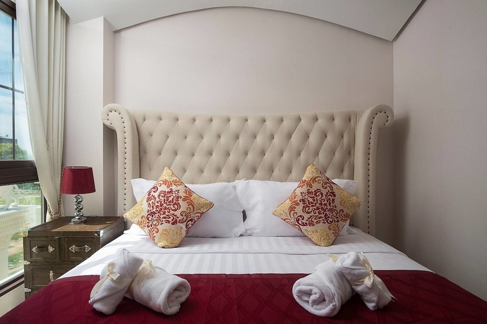 Imagen de la habitación del Hotel The Symphony Suites Pattaya. Foto 10