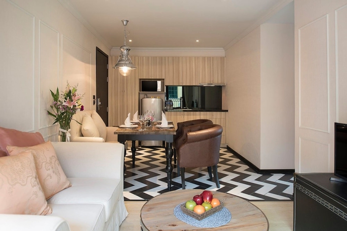 Imagen de la habitación del Hotel The Symphony Suites Pattaya. Foto 17