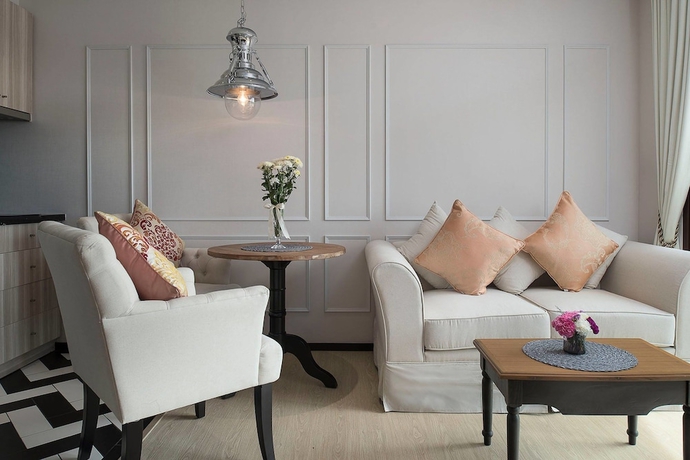 Imagen de la habitación del Hotel The Symphony Suites Pattaya. Foto 18