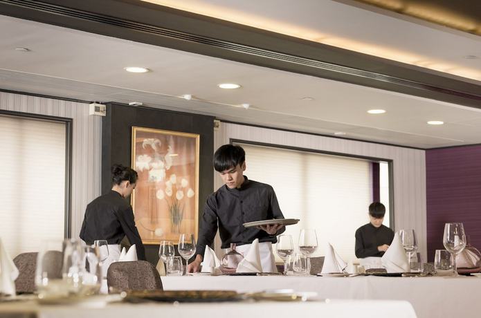 Imagen del bar/restaurante del Hotel The T. Foto 2