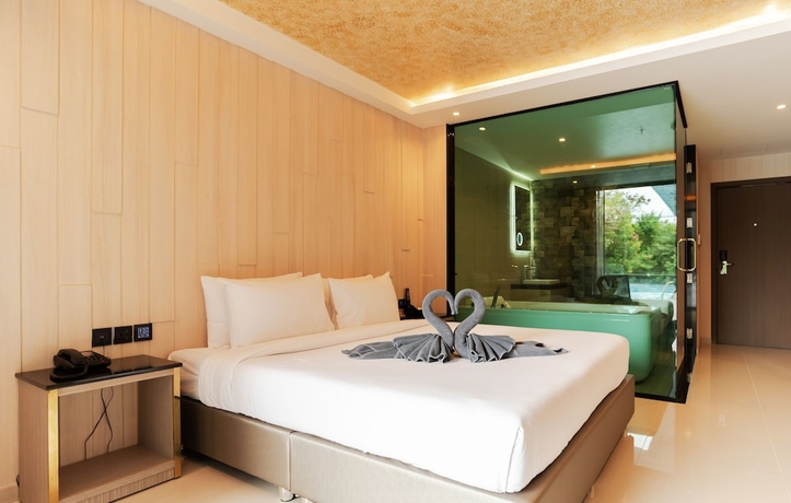 Imagen de la habitación del Hotel The TJ Hotel. Foto 10