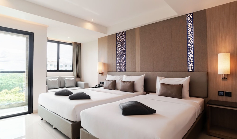 Imagen de la habitación del Hotel The TJ Hotel. Foto 11