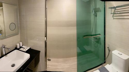 Imagen de la habitación del Hotel The TJ Jomtien. Foto 15