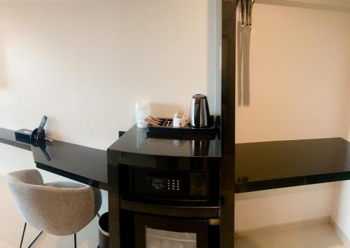 Imagen de la habitación del Hotel The TJ Jomtien. Foto 17