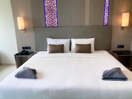 Imagen de la habitación del Hotel The TJ Jomtien. Foto 19