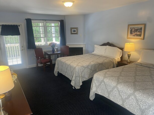 Imagen de la habitación del Hotel The Taber Inne and Suites. Foto 15